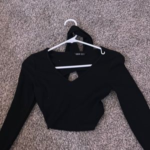 long sleeve black crop top with tie in the back for open back